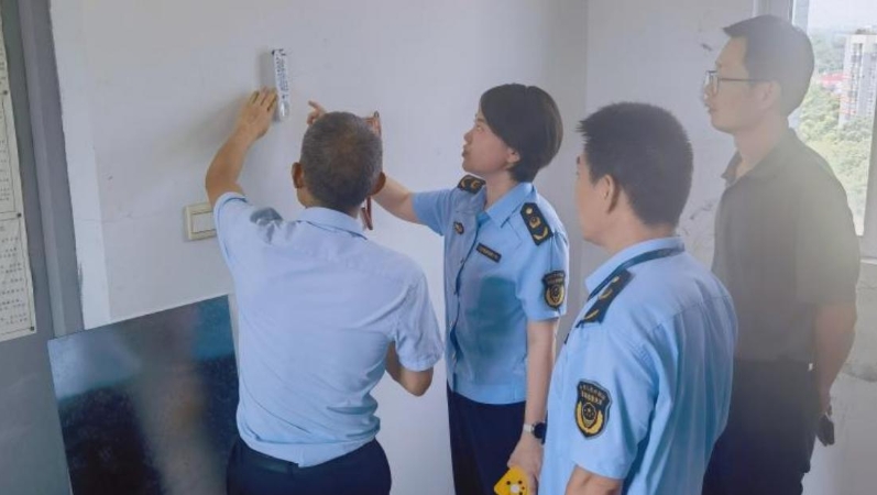 战高温——重庆高新区5023台电梯机房“退烧”记