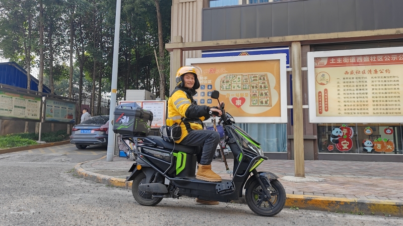 新春走基层丨在街头巷尾“跑”出团圆